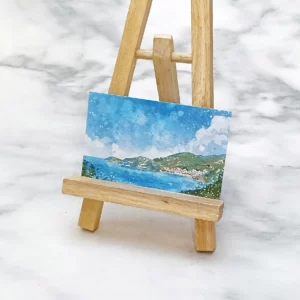 風景畫印刷品，以畫架展示。